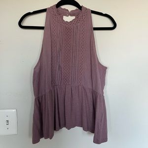 Sleeveless purple top. Size Medium